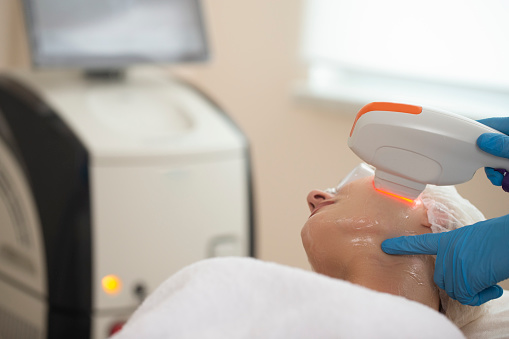 woman receiving IPL treatment